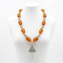 Collier Marocain en Perles Ambrées avec Pendentif Amazigh – Bijou Artisanal Unique